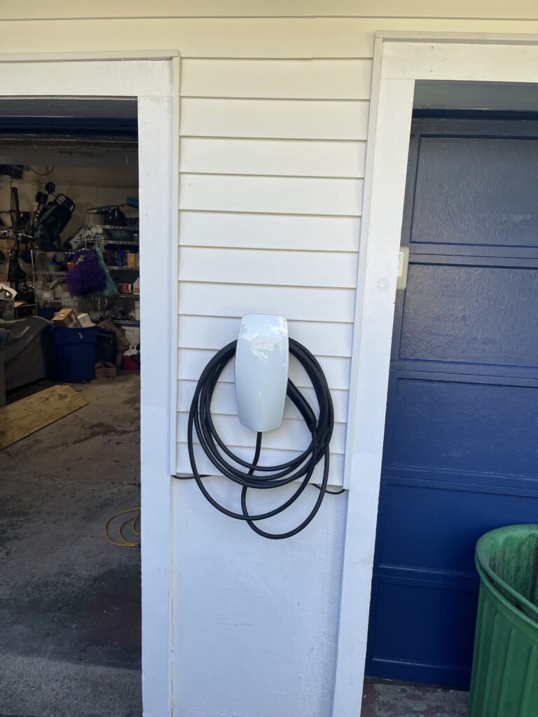 Wall-mounted electric vehicle charger at a residential property in Randolph, NJ.